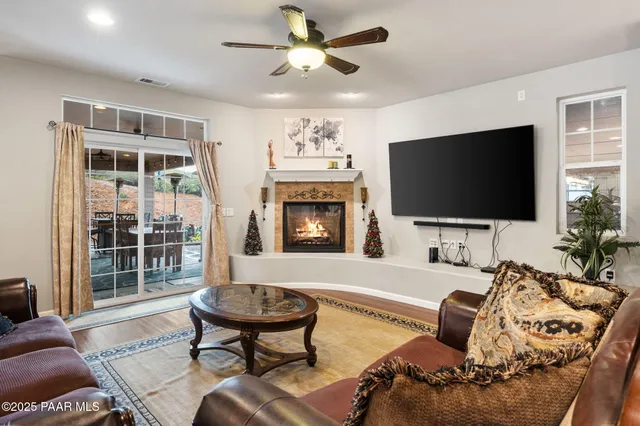 a large kitchen with a table and chairs