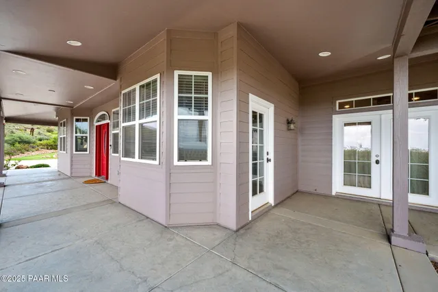 a front view of a house with garage