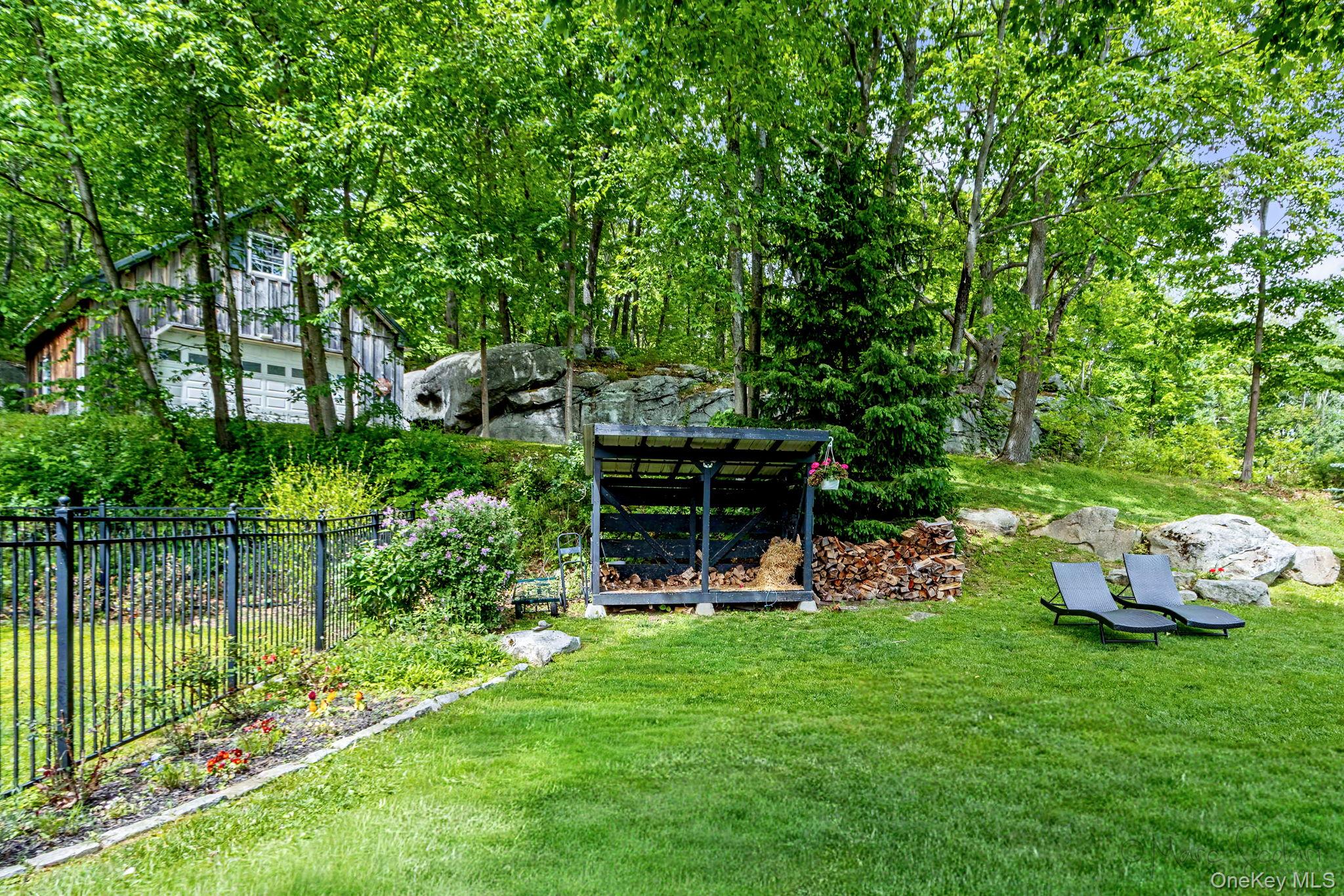 168 Old Rte 55 Pawling, NY 12564 - Photo 32 of 43 a view of a chair and tables in the garden