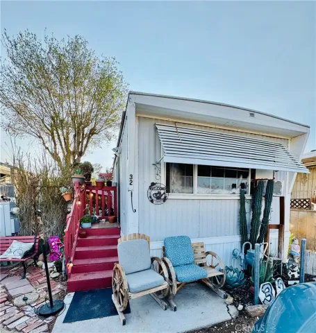 a view of a chairs and tables in the patio