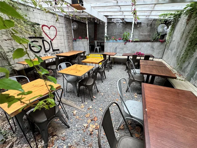 an outdoor space with lots of furniture