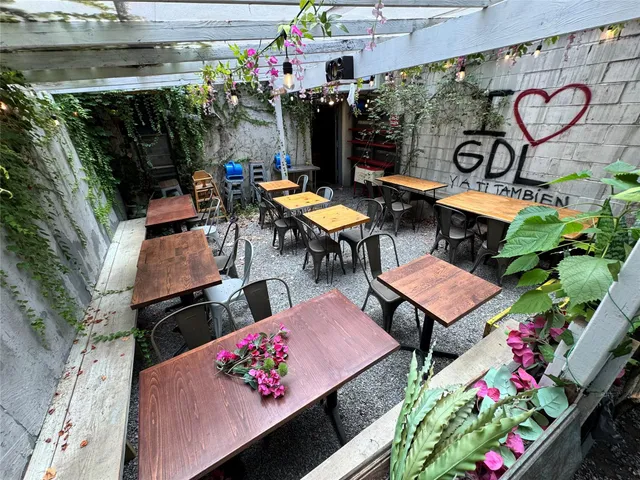 a view of a balcony with chairs