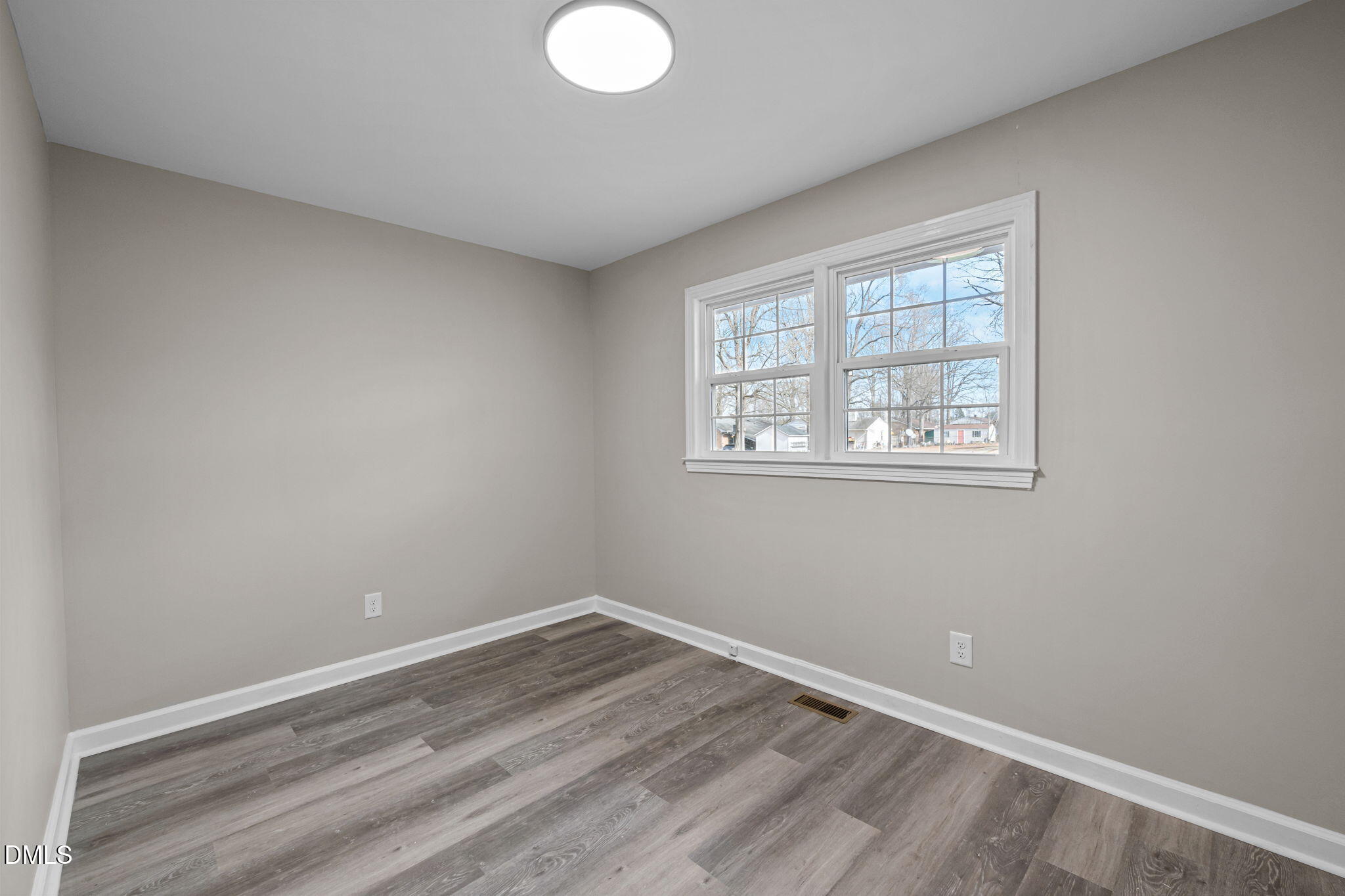 42 South 2nd Street Roxboro, NC 27573 - Photo 14 of 26 a view of empty room with wooden floor