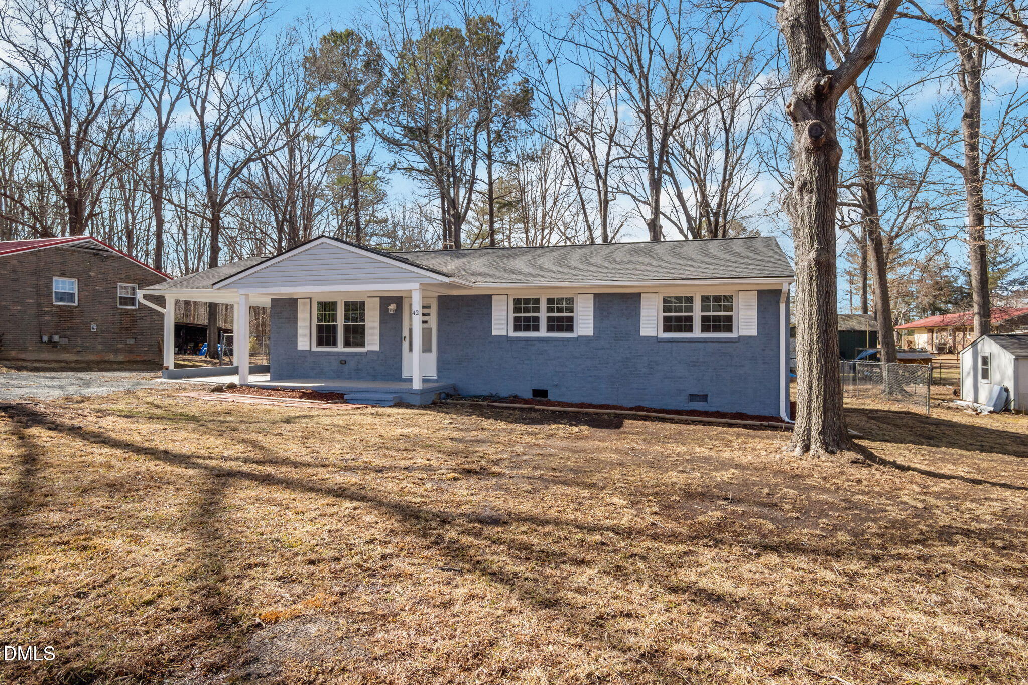 42 South 2nd Street Roxboro, NC 27573 - Photo 2 of 26 a front view of a house with a yard