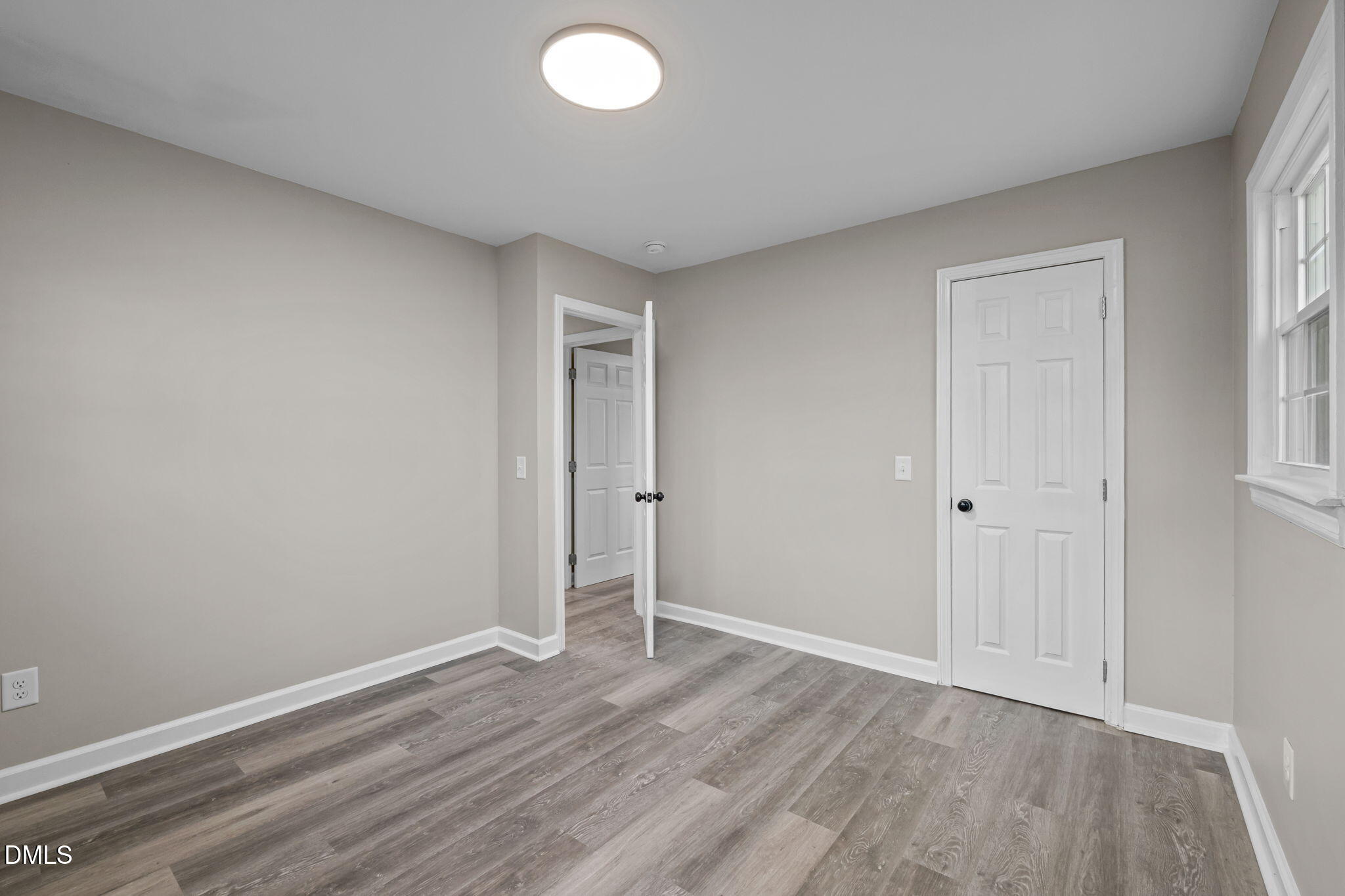 42 South 2nd Street Roxboro, NC 27573 - Photo 21 of 26 a view of an empty room and window
