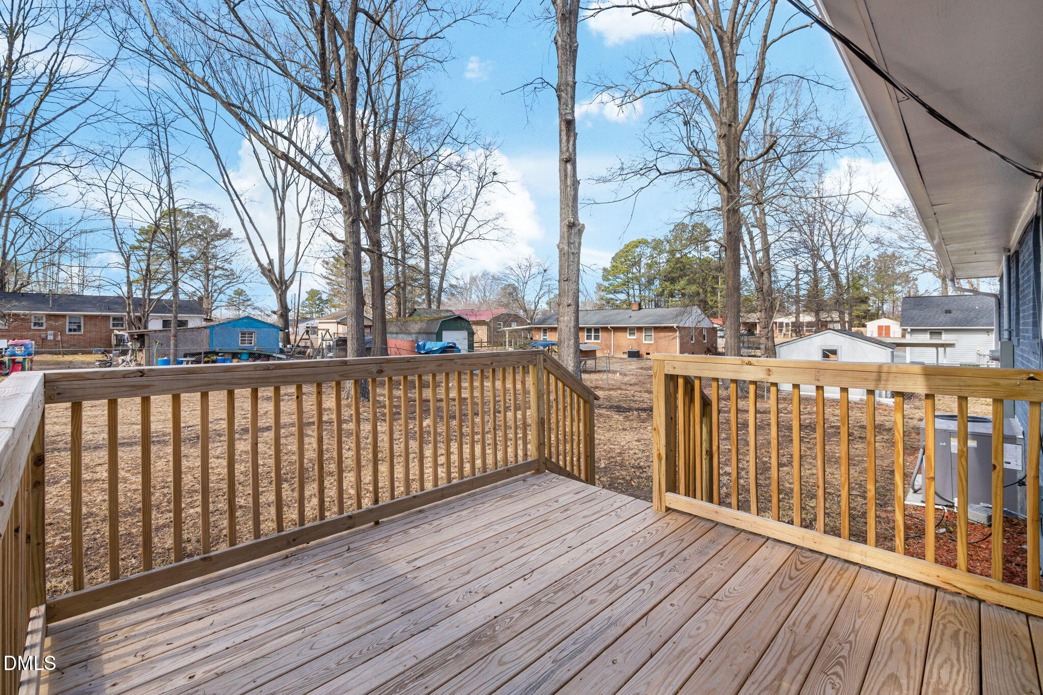 42 South 2nd Street Roxboro, NC 27573 - Photo 22 of 26 a view of a wooden deck with a yard