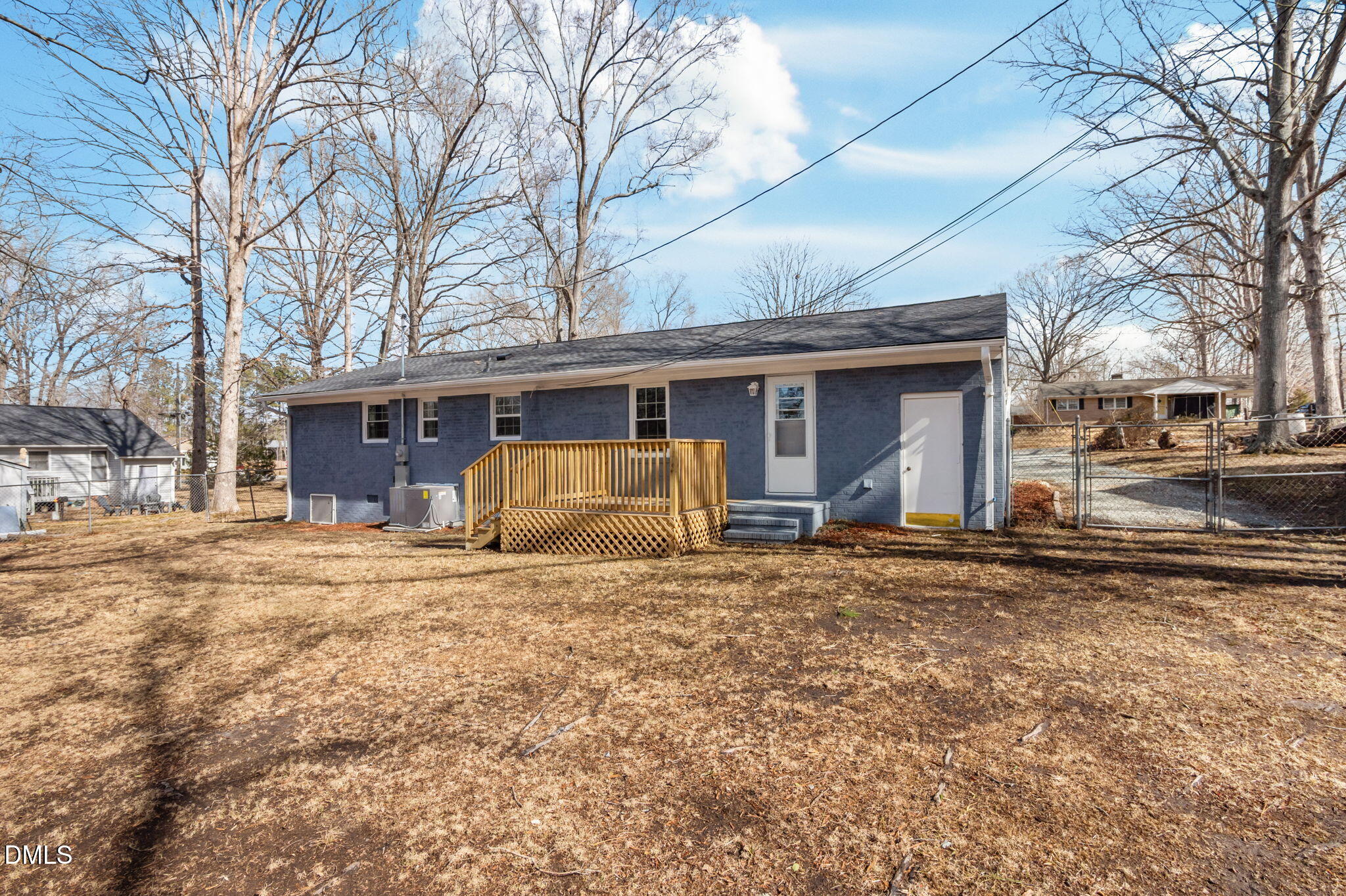 42 South 2nd Street Roxboro, NC 27573 - Photo 24 of 26 a house with trees in front of it