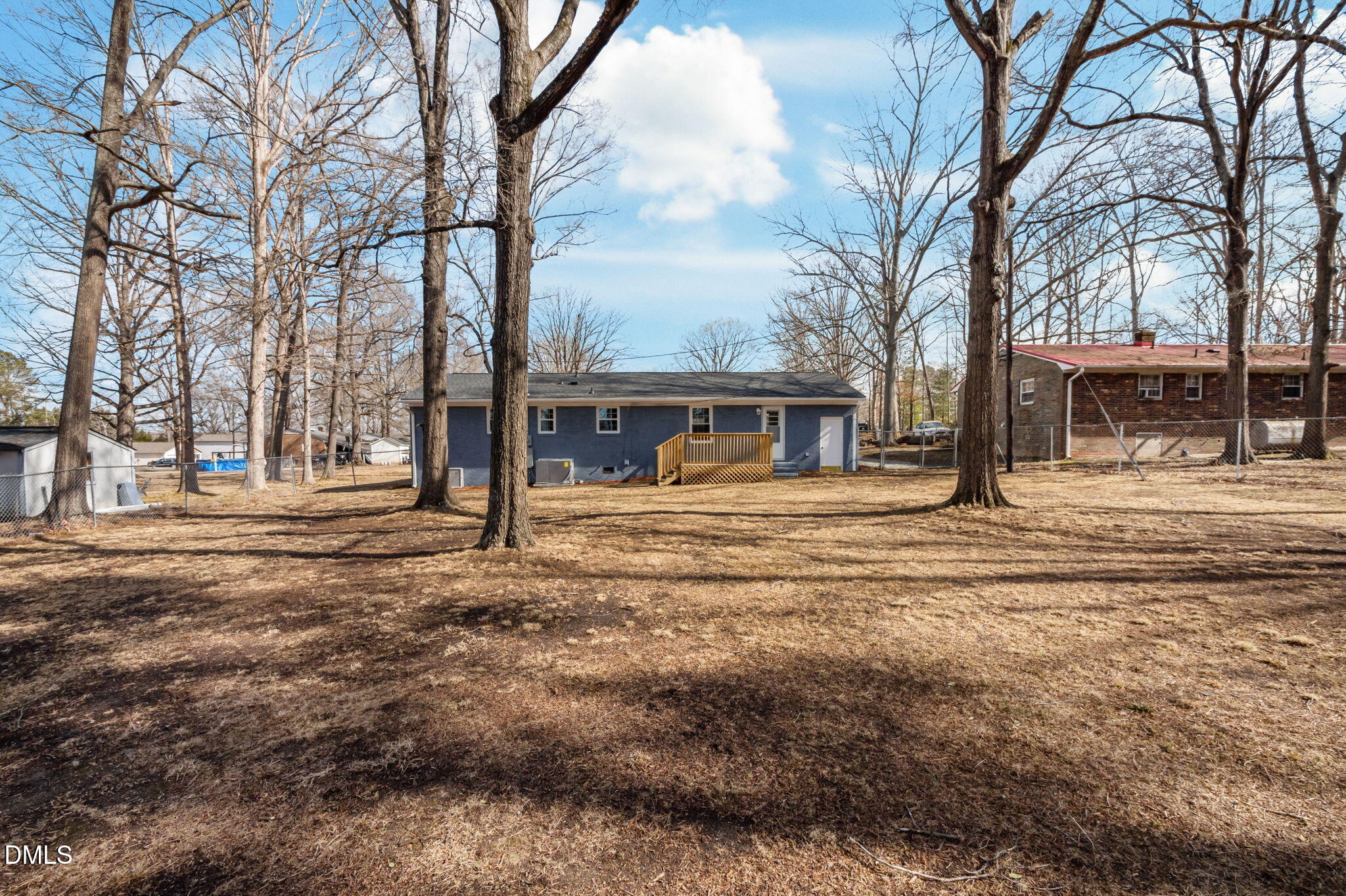 42 South 2nd Street Roxboro, NC 27573 - Photo 25 of 26 a front view of a house with a yard and large trees