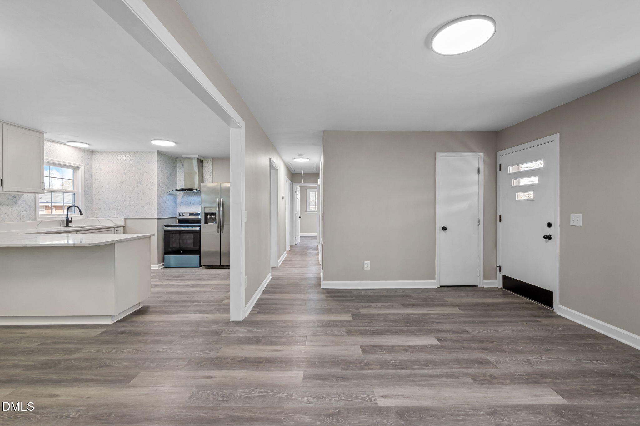 42 South 2nd Street Roxboro, NC 27573 - Photo 5 of 26 a view of kitchen with wooden floor
