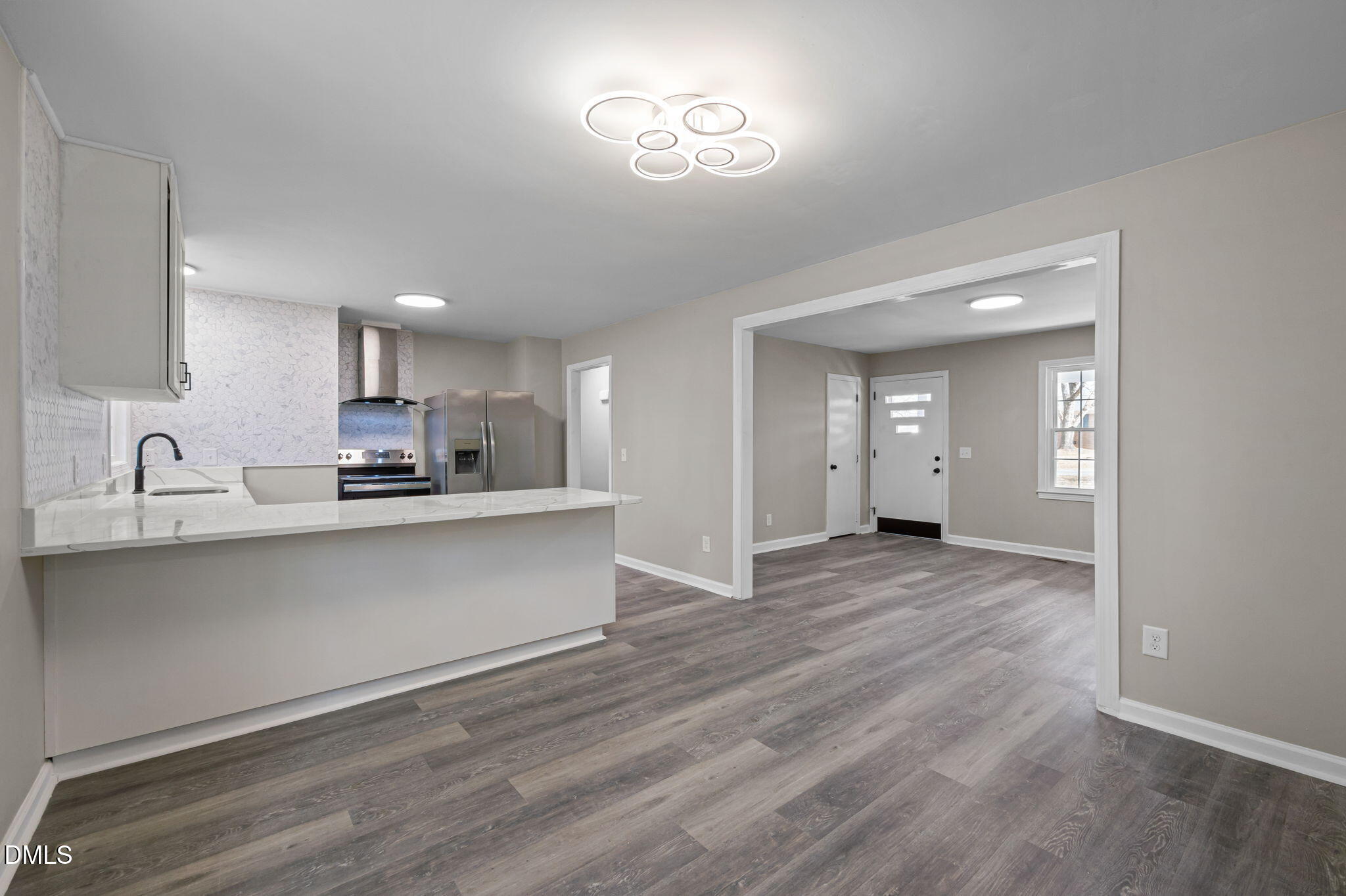 42 South 2nd Street Roxboro, NC 27573 - Photo 7 of 26 a view of kitchen with sink and wooden floor