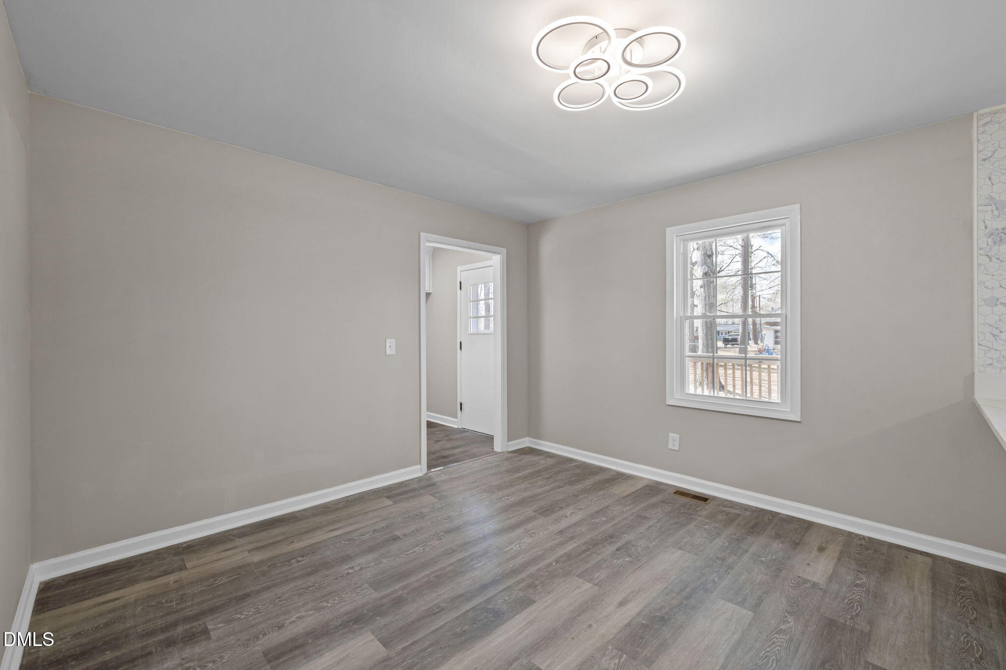 42 South 2nd Street Roxboro, NC 27573 - Photo 8 of 26 an empty room with a window