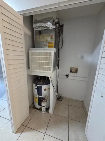 a view of storage and utility room