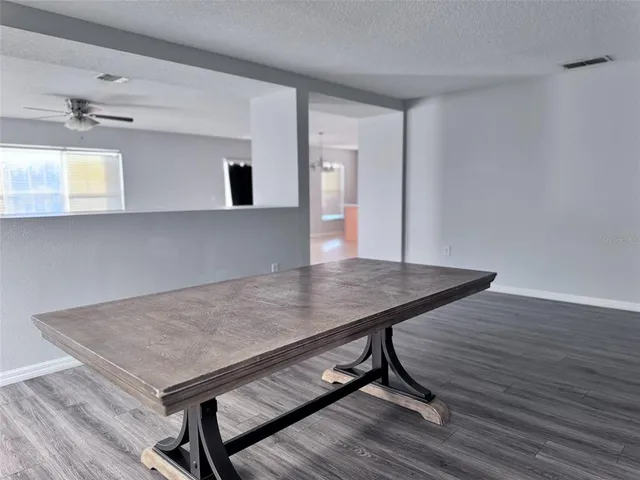 a view of kitchen island with wooden floor and wooden floor