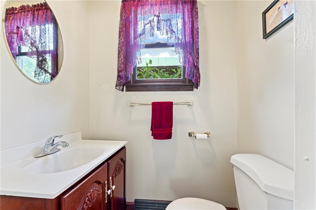 20 Sturge Hollow Road Amity, PA 15311 - Photo 15 of 30 a bathroom with a toilet a sink and a mirror