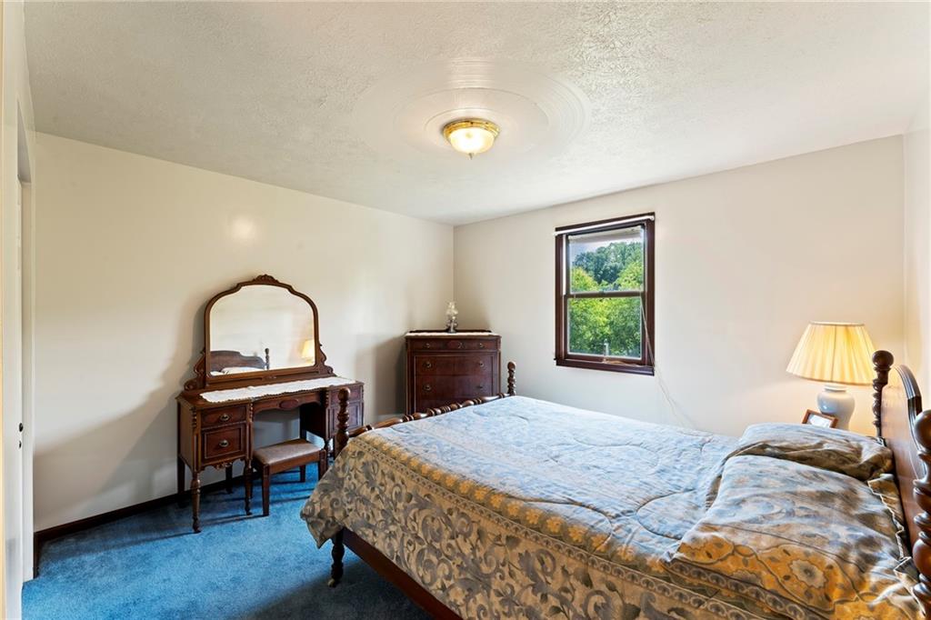 20 Sturge Hollow Road Amity, PA 15311 - Photo 21 of 30 a bedroom with a bed and a window