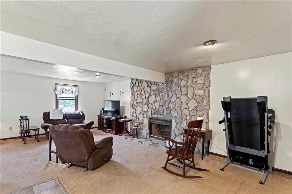 20 Sturge Hollow Road Amity, PA 15311 - Photo 8 of 30 a living room with furniture and a fireplace