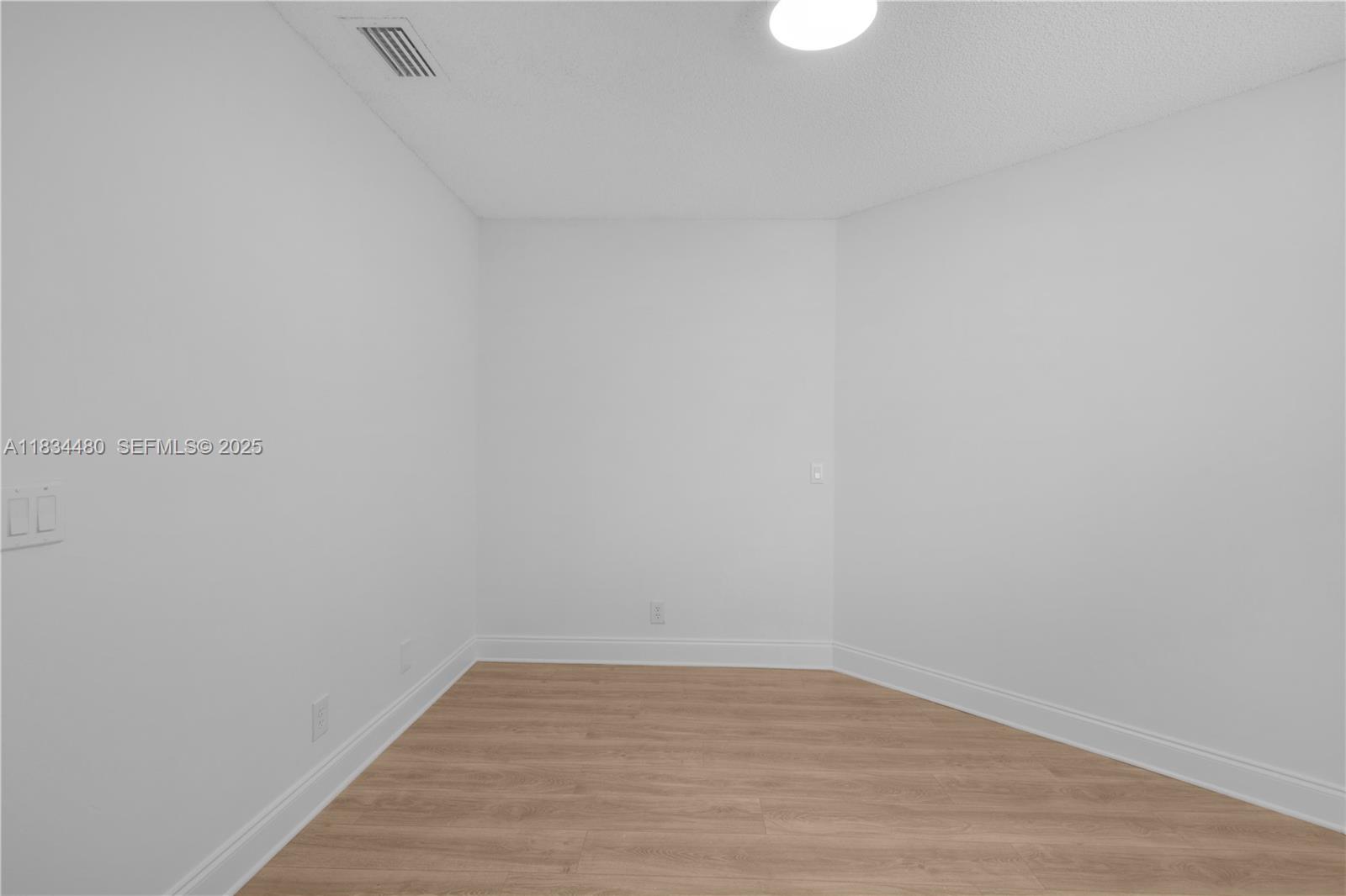 1525 Seabay Road Weston, FL 33326 - Photo 20 of 29 a view of an empty room