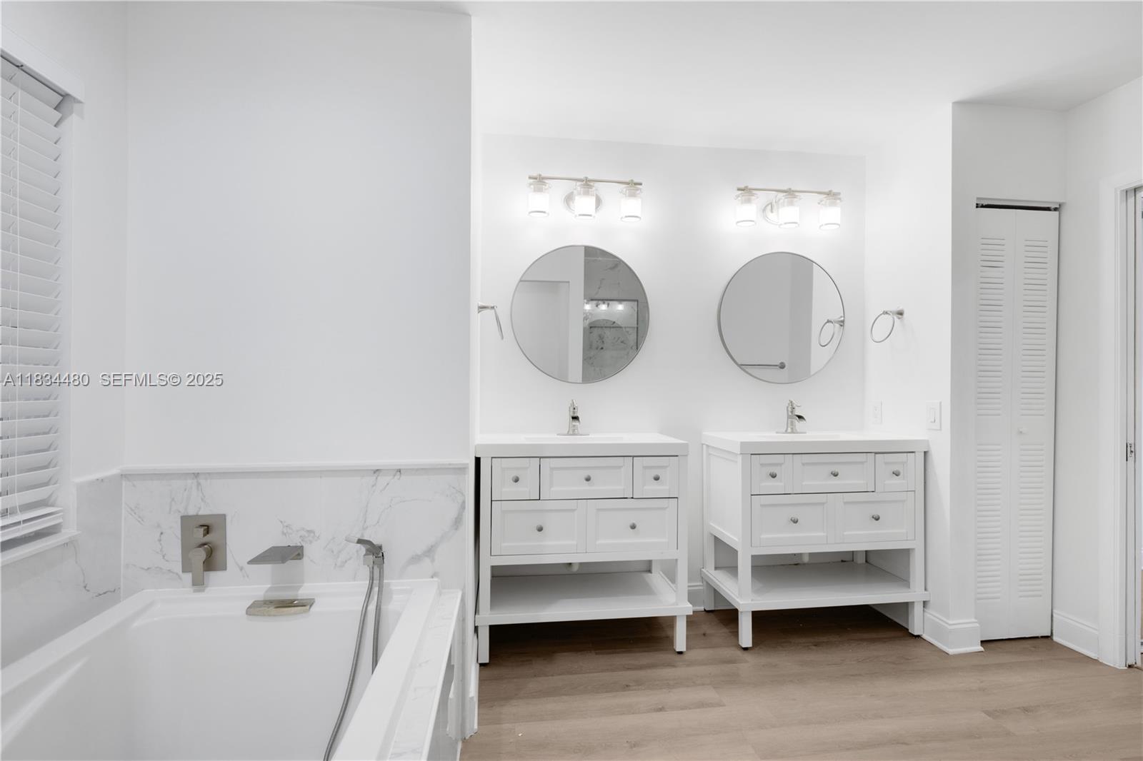 1525 Seabay Road Weston, FL 33326 - Photo 29 of 29 a bedroom with a bed and a dresser