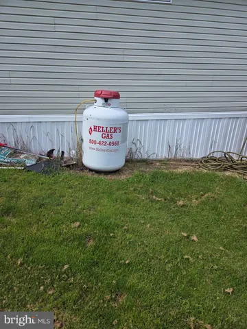 a sign that is sitting in the grass