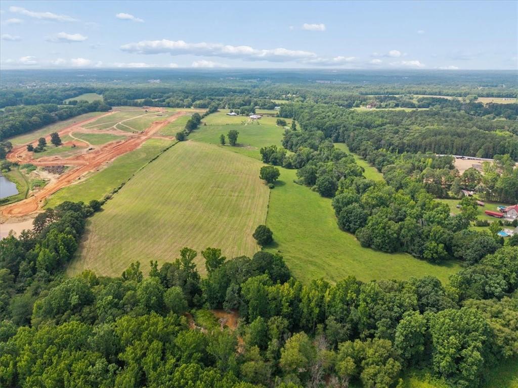 929 Nicholsville Road Monroe, GA 30656 - Photo 26 of 32 a view of a lake with a city