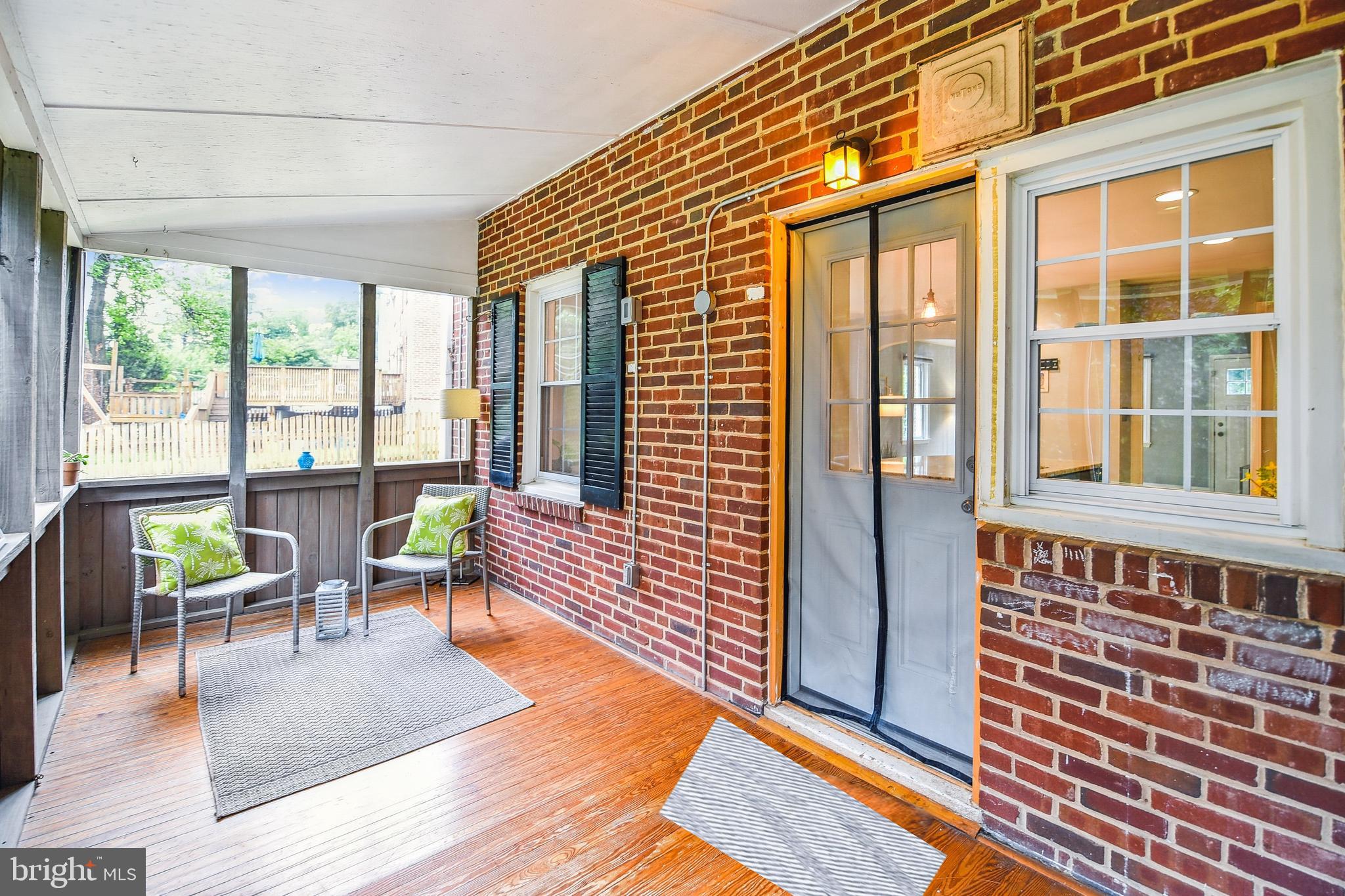 130 Stanmore Road Baltimore, MD 21212 - Photo 23 of 70 a living room with furniture and floor to ceiling windows