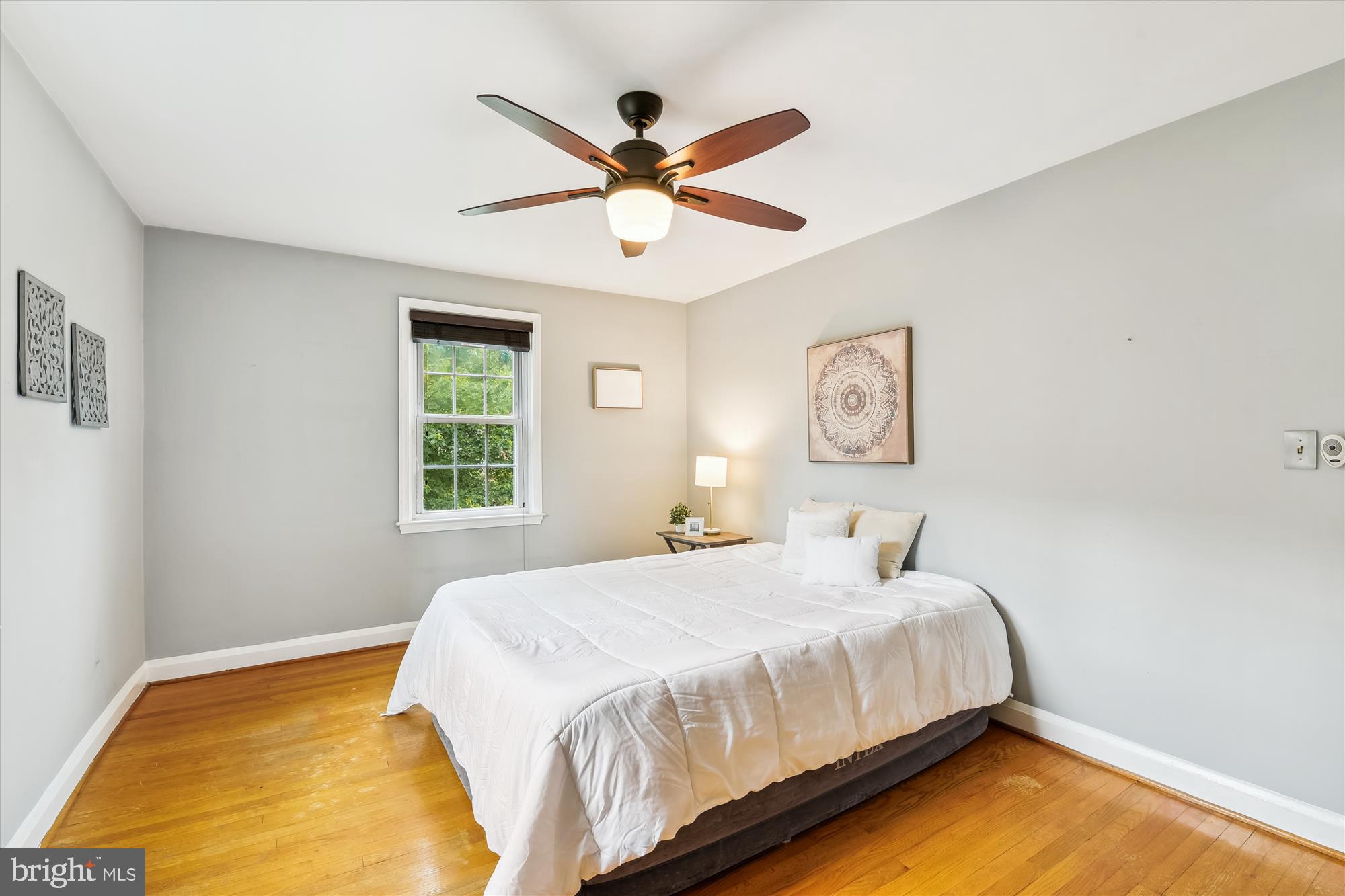 130 Stanmore Road Baltimore, MD 21212 - Photo 27 of 70 a bedroom with a bed and window