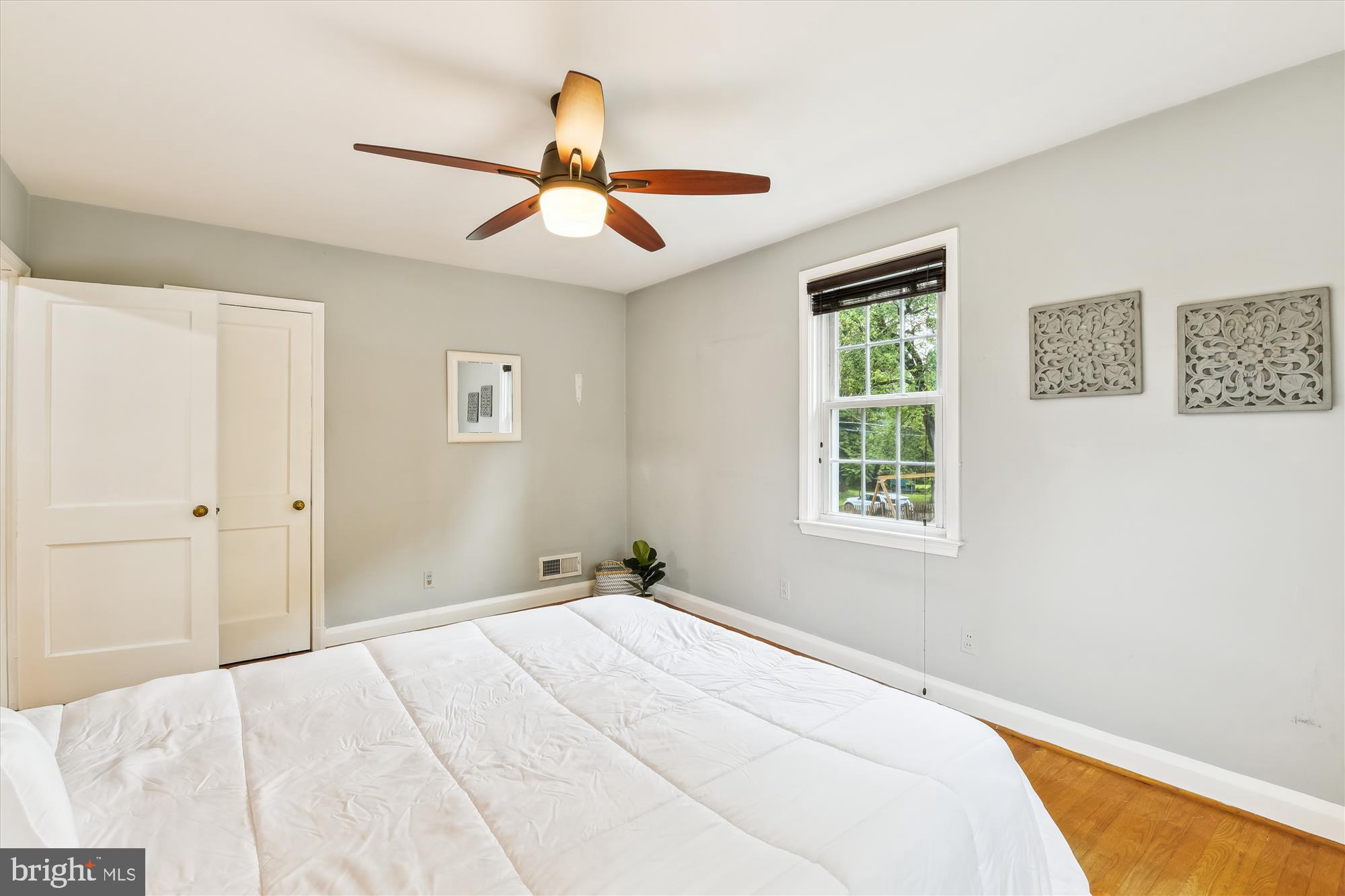 130 Stanmore Road Baltimore, MD 21212 - Photo 28 of 70 a bedroom with a large bed and a window