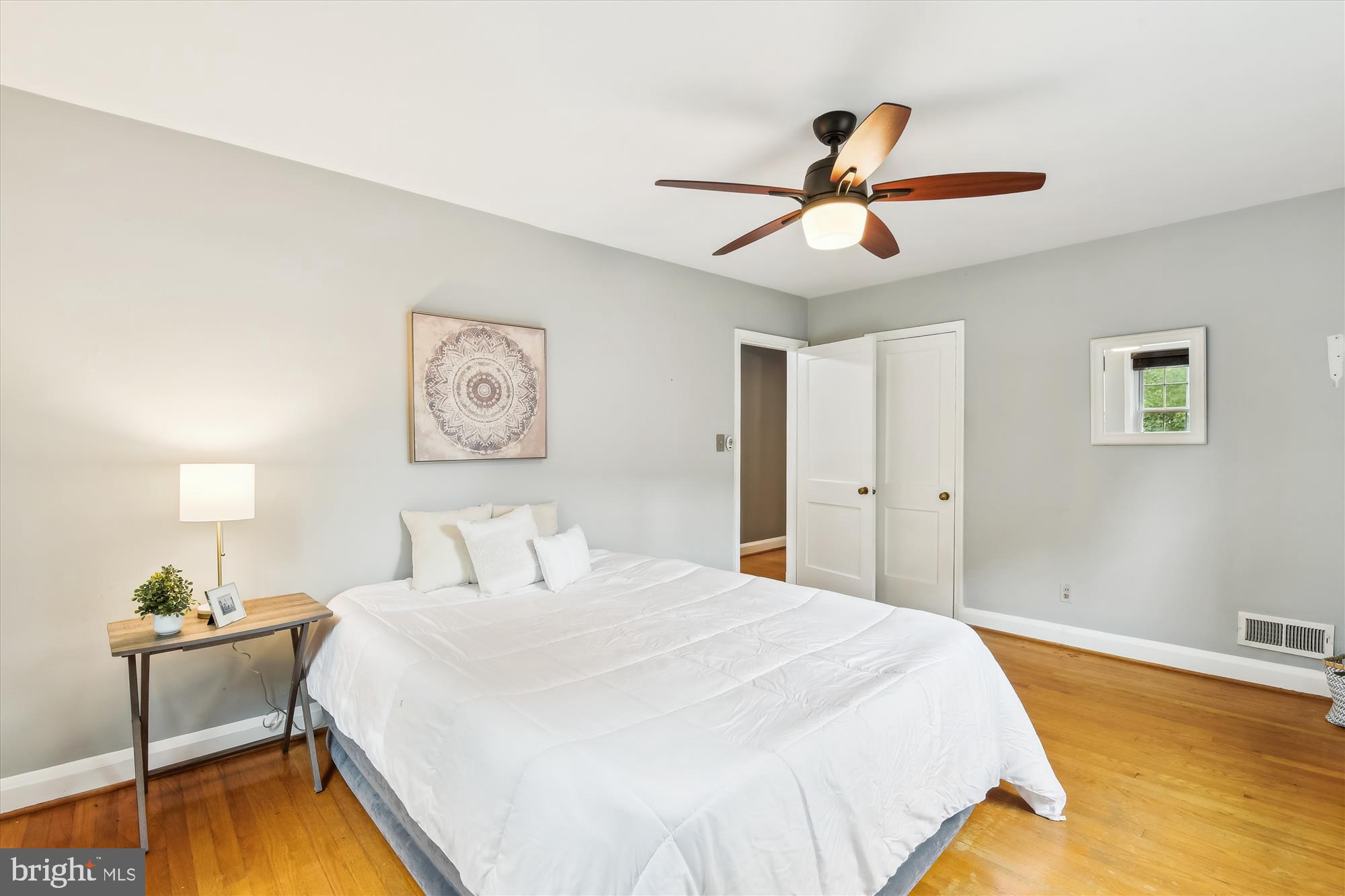 130 Stanmore Road Baltimore, MD 21212 - Photo 29 of 70 a bedroom with a bed and a chandelier