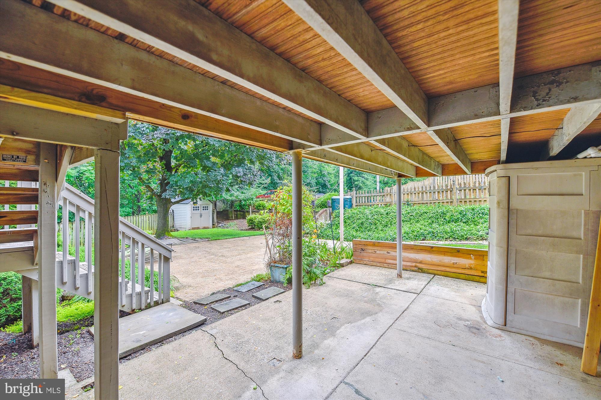 130 Stanmore Road Baltimore, MD 21212 - Photo 43 of 70 a view of a porch with furniture and a backyard