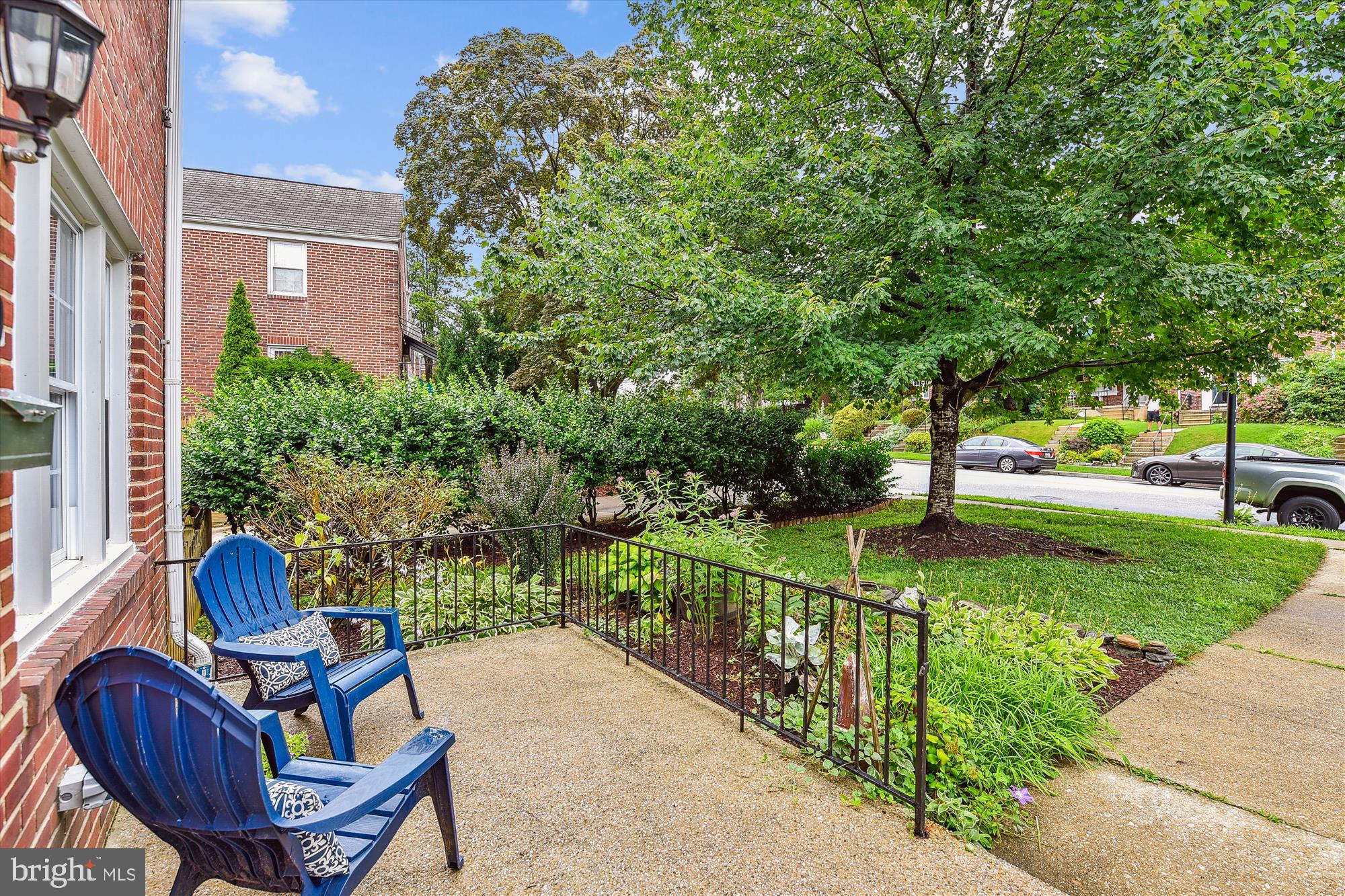 130 Stanmore Road Baltimore, MD 21212 - Photo 5 of 70 a view of a chair and table in the patio with a yard