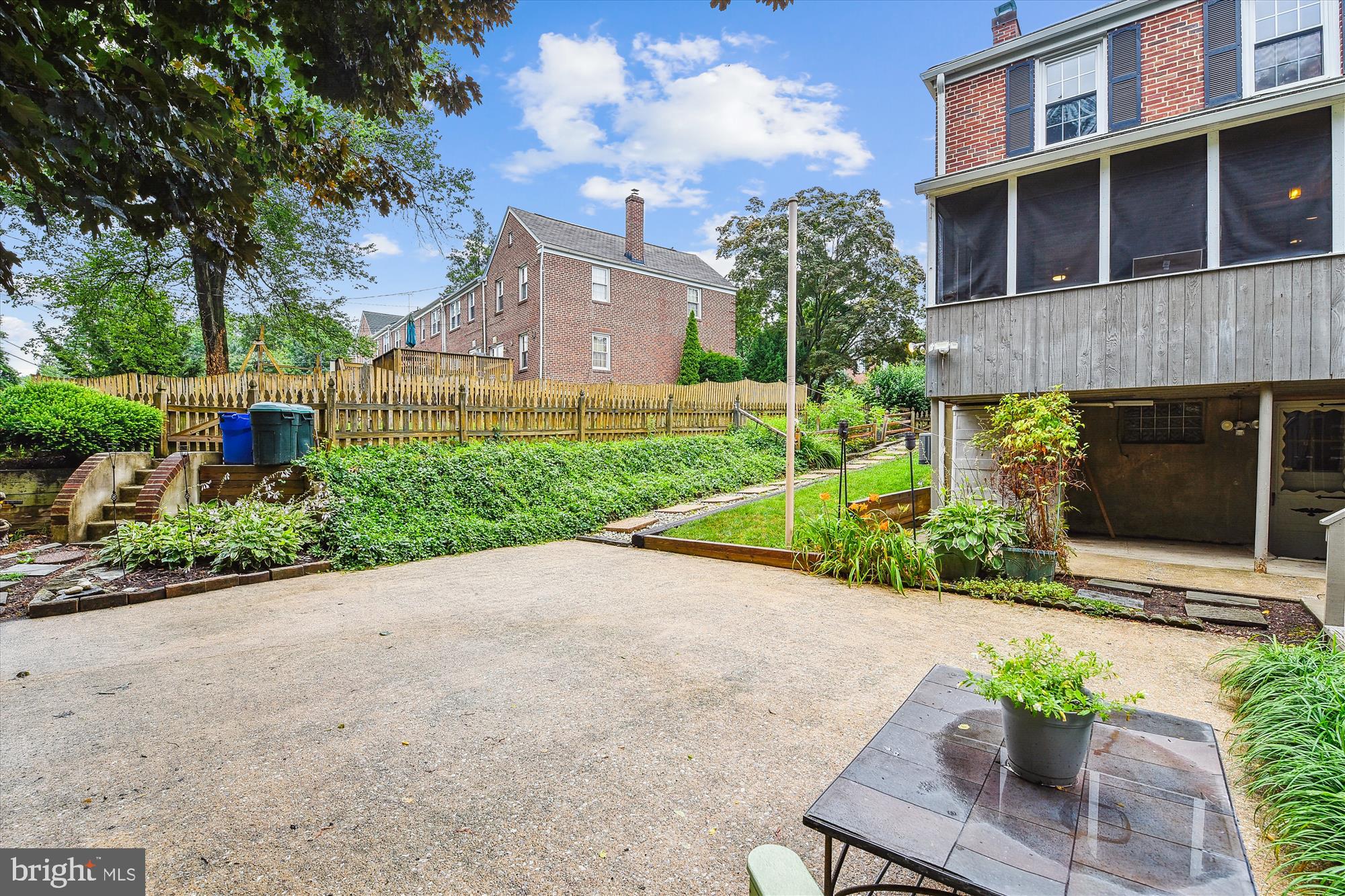 130 Stanmore Road Baltimore, MD 21212 - Photo 59 of 70 a view of a garden with a bench