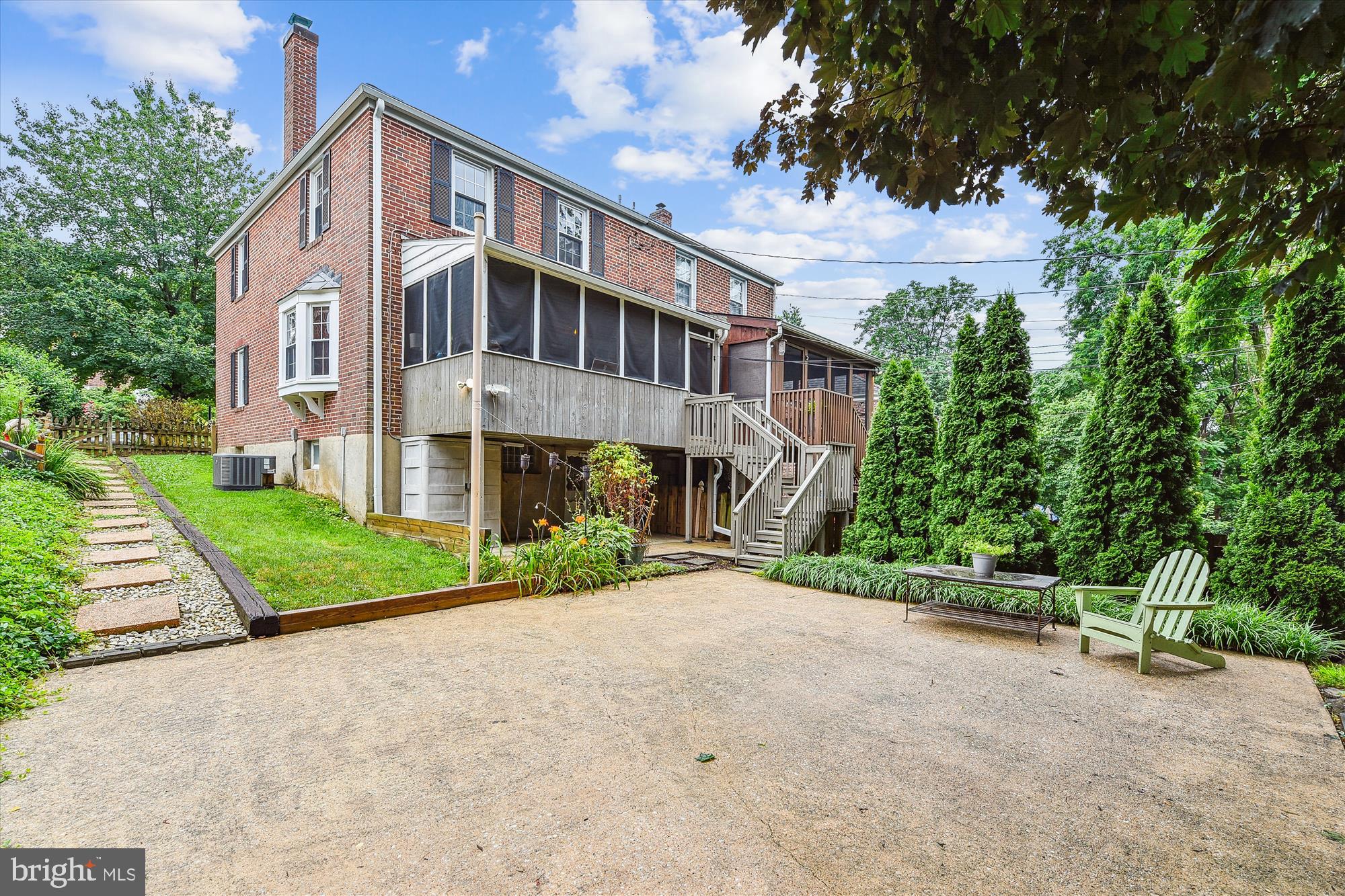 130 Stanmore Road Baltimore, MD 21212 - Photo 60 of 70 a front view of a house with a yard and trees