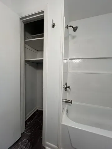 a bathroom with a bathtub