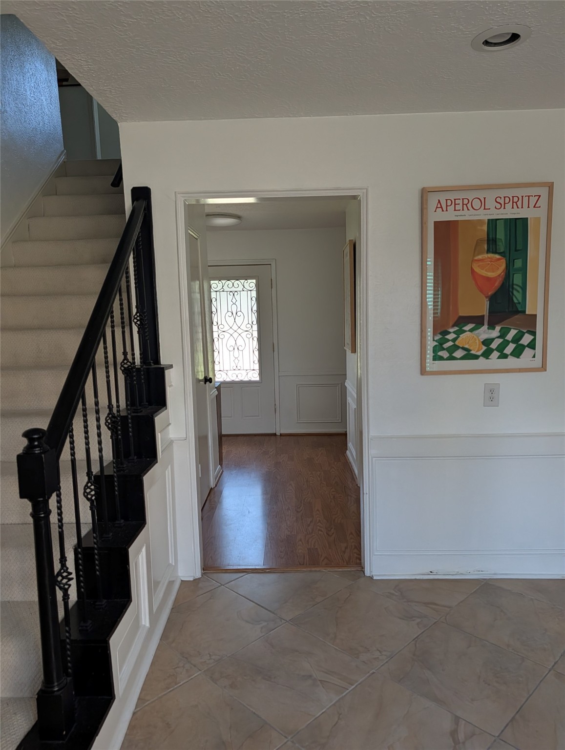 7810 12 Fairway Lane Humble, TX 77346 - Photo 12 of 18 a view of an entryway with wooden floor