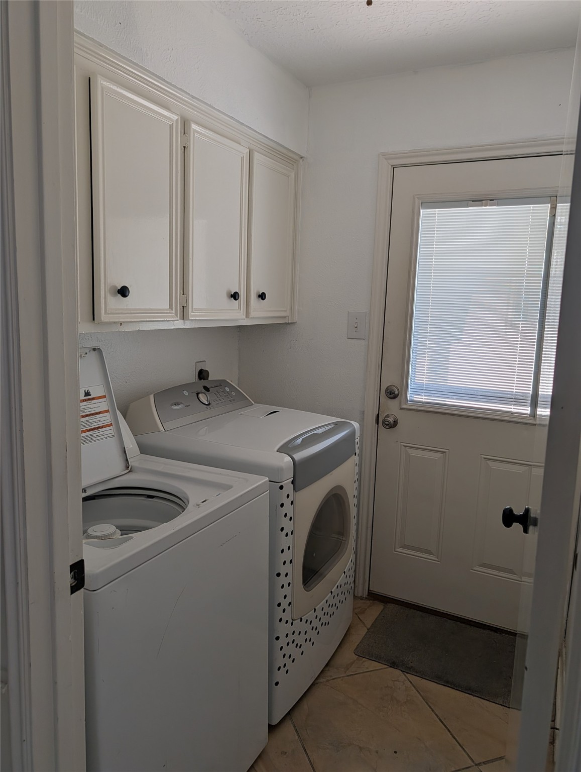 7810 12 Fairway Lane Humble, TX 77346 - Photo 15 of 18 a utility room with dryer and washer