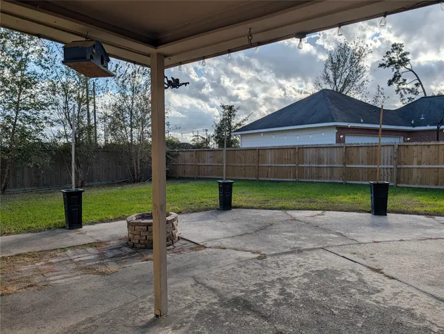 a view of a park with a large tree