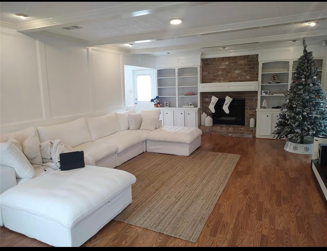 7810 12 Fairway Lane Humble, TX 77346 - Photo 5 of 18 a living room with furniture and a fireplace