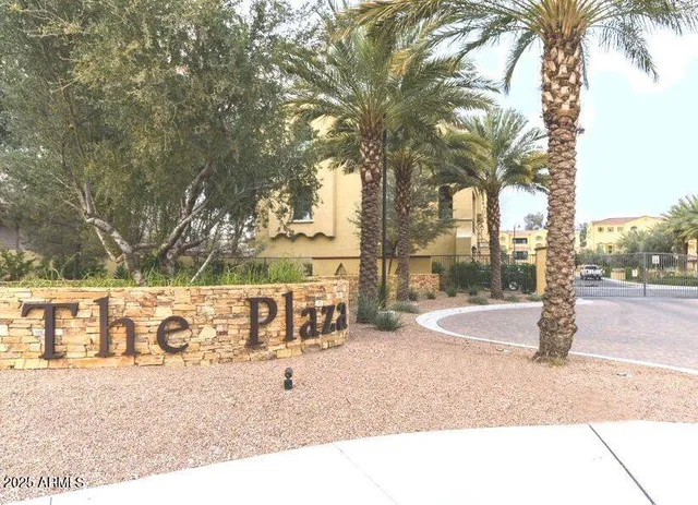 a street sign on the side of building