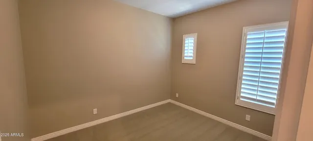 a spacious bathroom with a bathtub sink and toilet