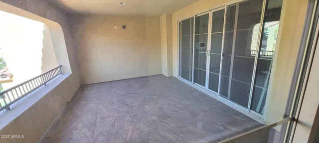 a view of a swimming pool with a yard