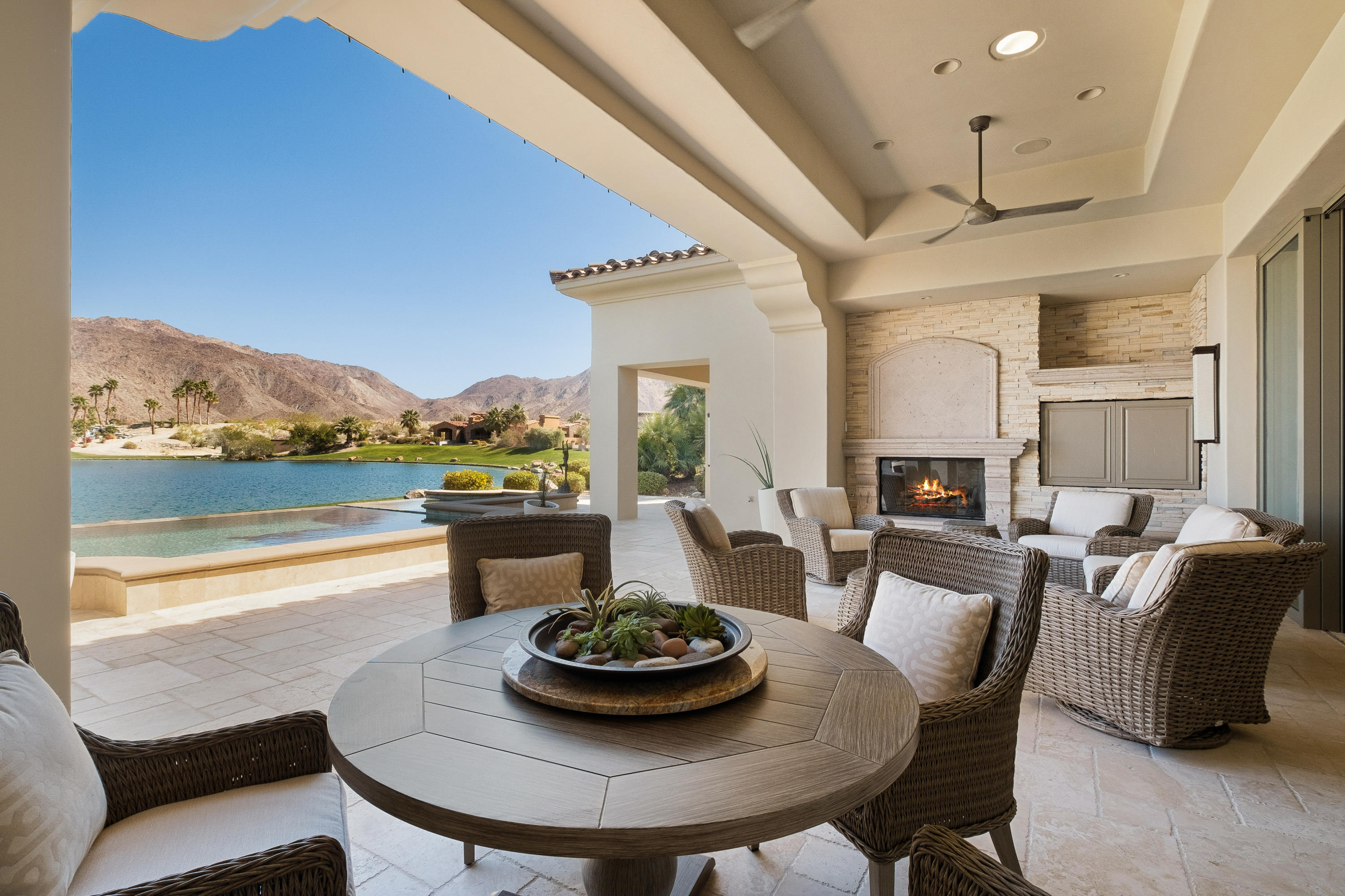 49953 Ridge View Way Palm Desert, CA 92260 - Photo 50 of 76 a living room with furniture and a dining table