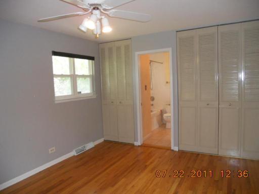 351 North Rohlwing Road Palatine, IL 60074 - Photo 11 of 11 wooden floor in an empty room with a window