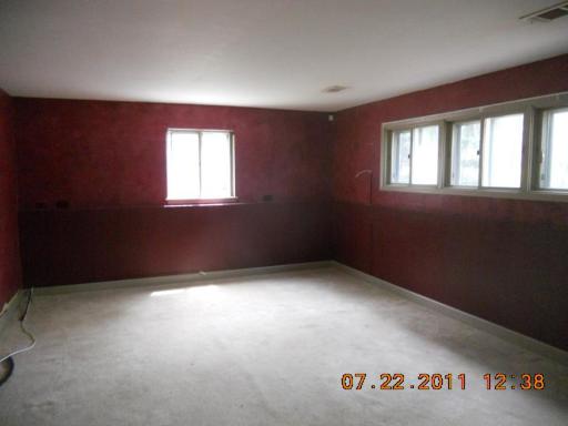 351 North Rohlwing Road Palatine, IL 60074 - Photo 10 of 11 an empty room with a window