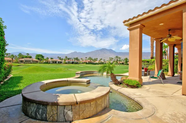 a view of a swimming pool and outdoor space