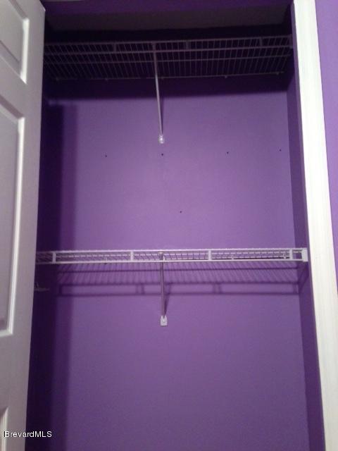 2882 Digby Road Southeast Palm Bay, FL 32909 - Photo 23 of 34 Bedroom 4 Closet Shelving