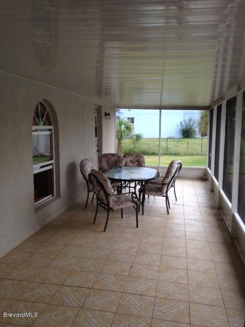 2882 Digby Road Southeast Palm Bay, FL 32909 - Photo 25 of 34 HUGE Screen Eclosed Porch