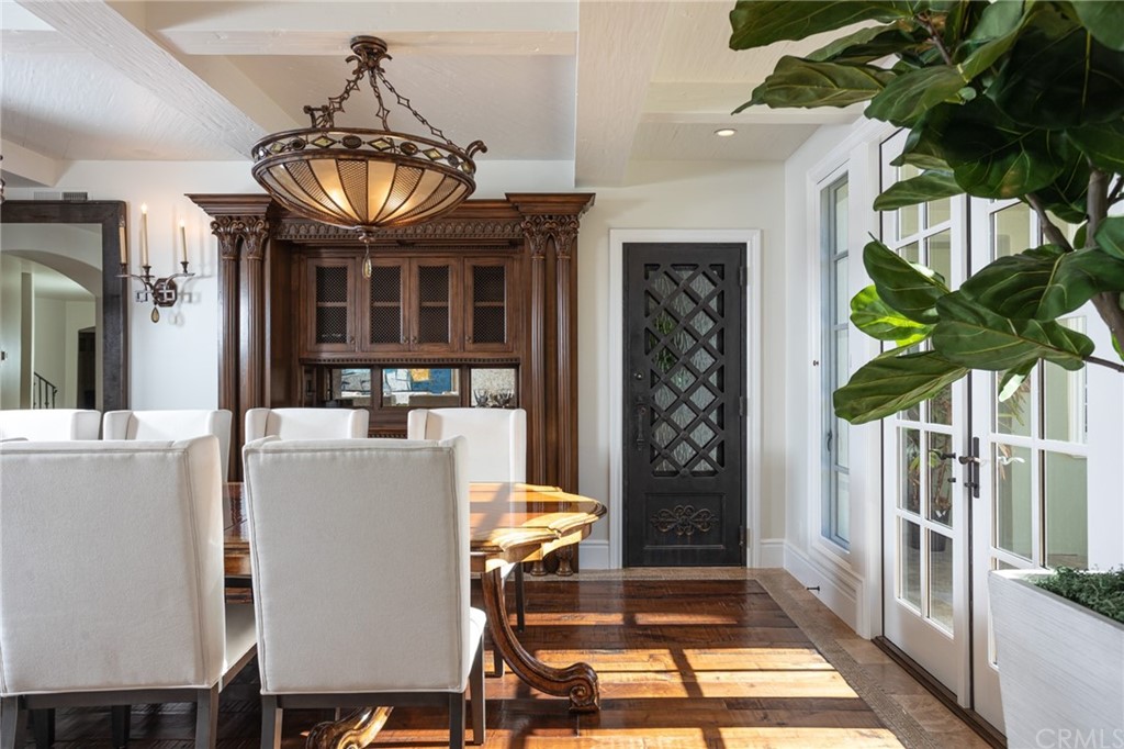 40 Smithcliffs Road Laguna Beach, CA 92651 - Photo 11 of 50 a view of a dining room with furniture window and wooden floor