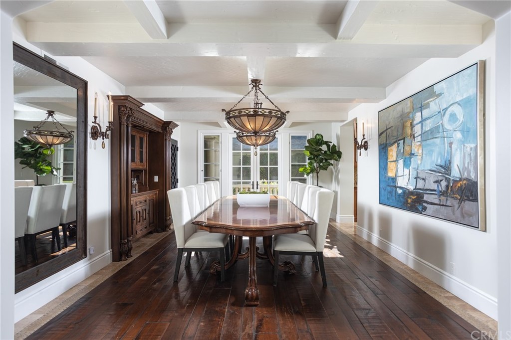 40 Smithcliffs Road Laguna Beach, CA 92651 - Photo 17 of 50 a view of a dining room with furniture window and wooden floor