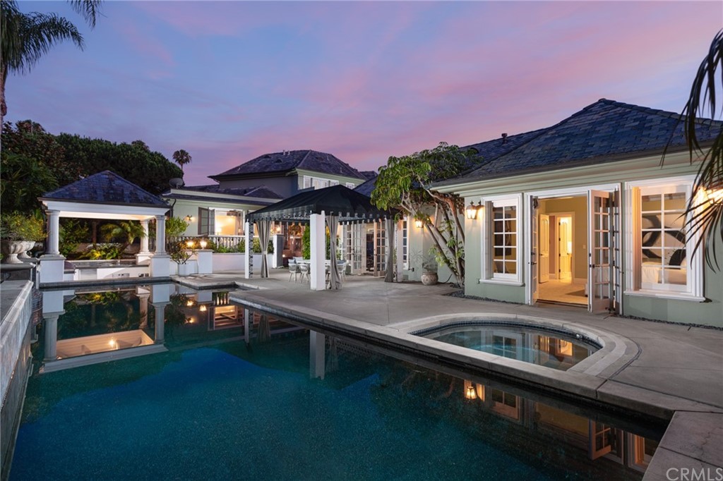 40 Smithcliffs Road Laguna Beach, CA 92651 - Photo 2 of 50 a view of house with swimming pool and outdoor seating