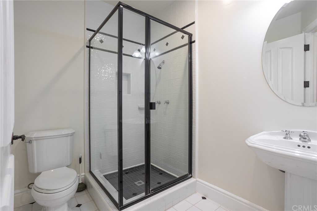 40 Smithcliffs Road Laguna Beach, CA 92651 - Photo 23 of 50 a bathroom with a shower toilet and a sink